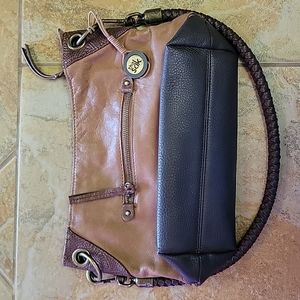 Used The Sak brand Purae